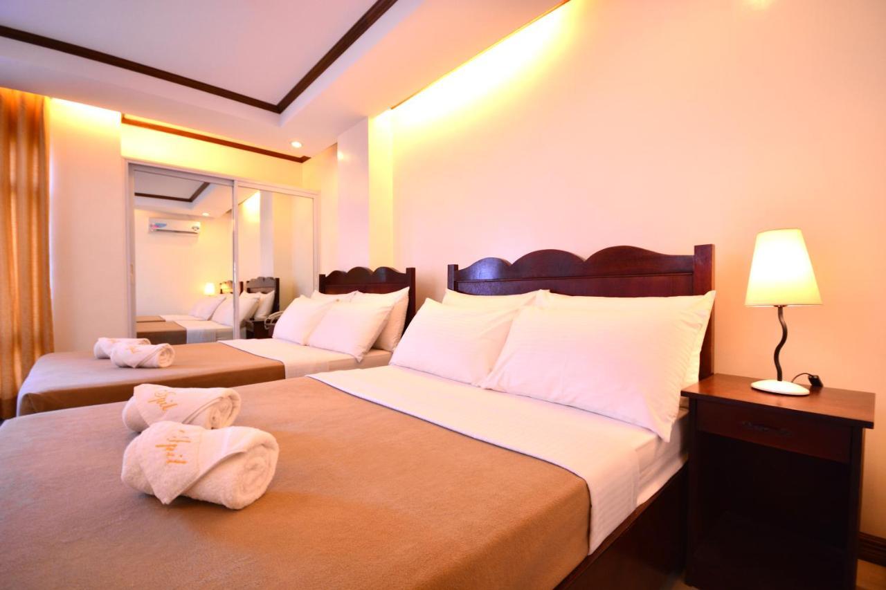 Ipil Suites Puerto Princesa Buitenkant foto